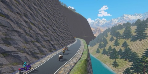 In-game: riders on a narrow cliff road cut into the rock above a turquoise river