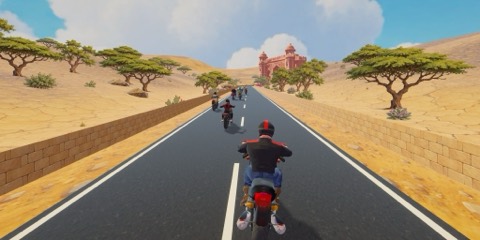 In-game: a desert highway in Rajasthan with a sandstone fort on the horizon